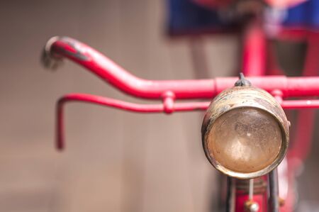 Old bicycle part. Photo is focused at upper area of the front light.の写真素材