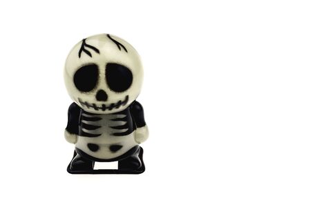 Skeleton toy for Halloween decoration isolated over whiteの写真素材