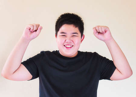 Thai boy is showing happy expressionの写真素材
