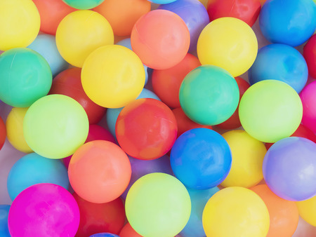 Colorful plastic toy balls backgroundの写真素材