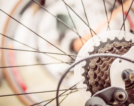 Warm vintage style photo of close up bicycle gearの写真素材