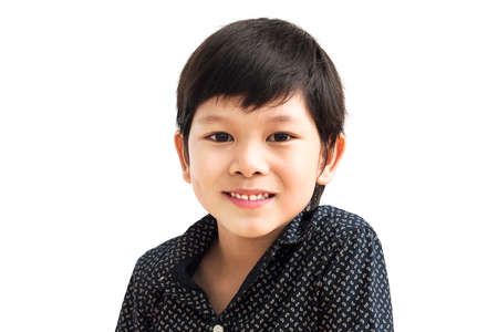 Portrait of smiling boy isolated over white backgroundの写真素材