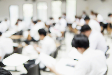 Blurred picture of student in the examination roomの写真素材