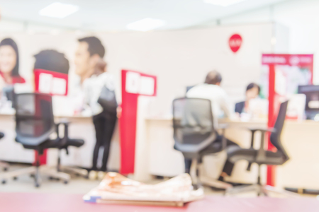 Blurred photo of  business customer service room with some of peopleの写真素材