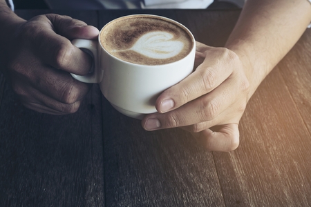 Vintage coffee with Latte art decorationの写真素材