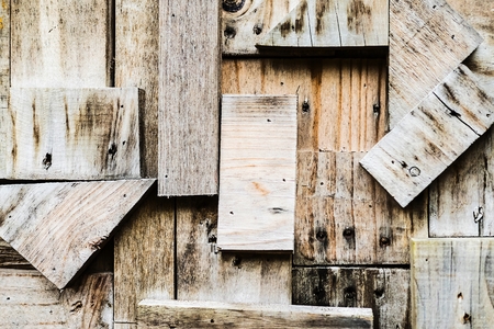 Old wood pieces block wall texture backgroundの写真素材