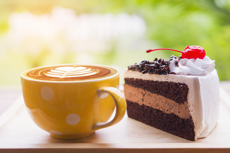 Chocolate cake with coffee cupの写真素材