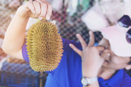 Man making durian disgusting expressionの写真素材