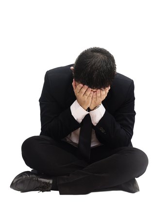 Business man sitting sadlyの写真素材