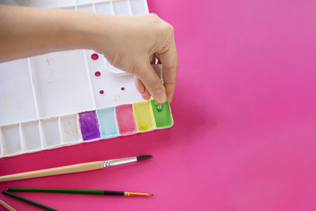 People painting colorful Easter eggs - Easter holiday celebration conceptの写真素材