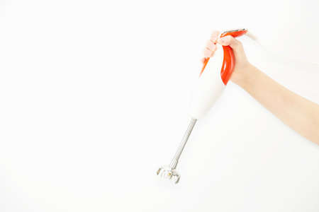 Happy lady holding kichen stuff over copy space background - people home made food preparation...