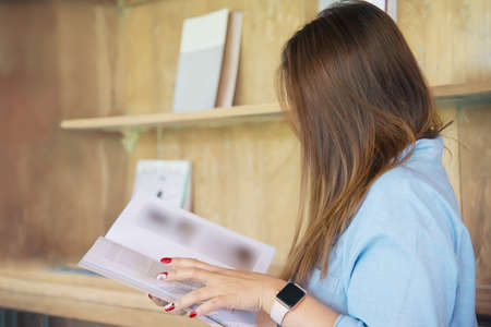 Portrait happy young Asian lady in coffee shop - woman in relax time concept