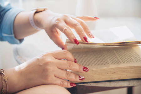 Portrait happy young Asian lady in coffee shop - woman in relax time conceptの写真素材