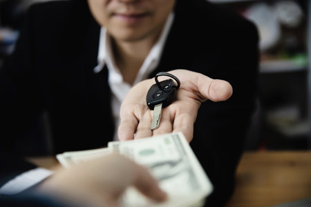 Business man show money bank note make financial plan invite people to sell or buy house and car - monetary properties loan credit insurance conceptの写真素材