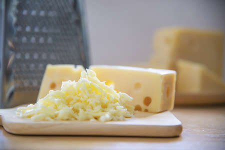 Beautiful cheeses in the kitchen - cheese food preparing concept