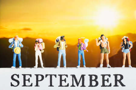 Small traveller figure for World Tourism Day background - September 27, UNWTO World Tourism Day celebration conceptの写真素材