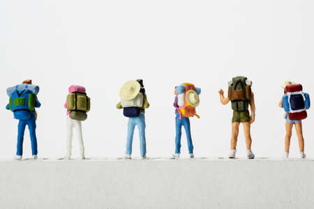 Small traveller figure for World Tourism Day background - September 27, UNWTO World Tourism Day...
