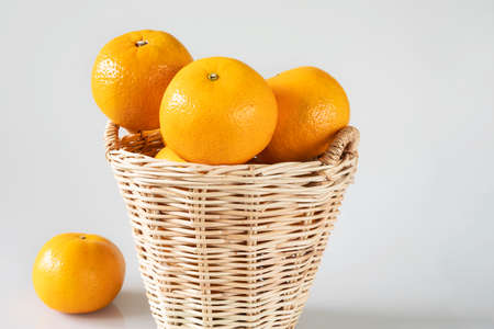 Fresh juicy orange fruit set over white background - tropical orange fruit for background useの写真素材
