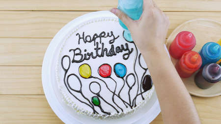 Birthday cake decoration using green yam making a colorful balloonの写真素材