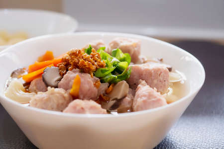 Macaroni soup with pork and carrot - delicious and healthy food conceptの写真素材