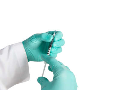 Doctor holding syringe preparing for injection his patient, isolated over white background