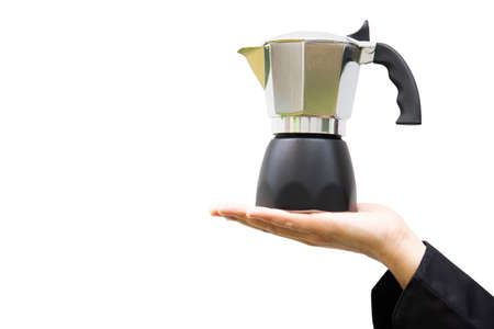 Barista's hand holding moka pot over white backgroundの写真素材
