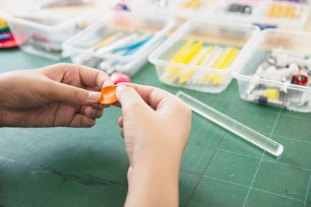 Boy is playing polymer clayの写真素材