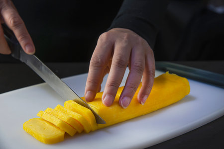 chef is preparing tamagoyagi for making japan cookery menu, japanese maki sushi roll serving in oriental restaurant, various different assorted luxury mixed healthy eating set conceptの写真素材