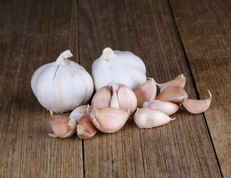 Garlic on the wooden backgroundの写真素材