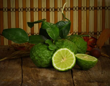 Bergamot on wooden background.の写真素材