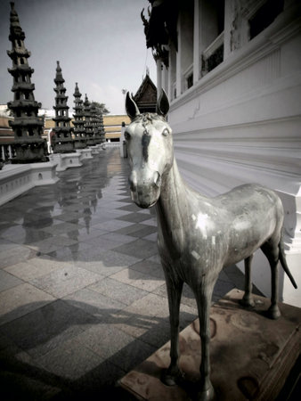 BANGKOK, THAILAND - January 4: Horse Statue on 4 January 2012 at ancient buddhist Temple (Wat Pho), Bangkok, Thailandのeditorial素材