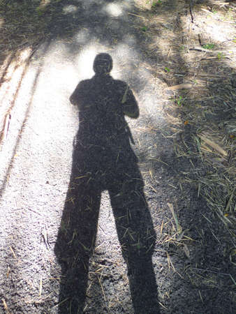 man shadow on floor