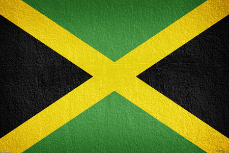 jamaica Flag on the old wall textureの写真素材