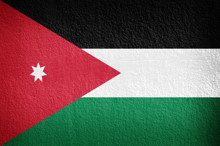 The Jordanian flag painted on grunge wallの写真素材