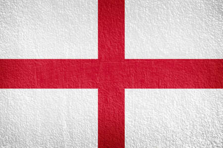 Grungy England Flag painted on concrete wallの写真素材
