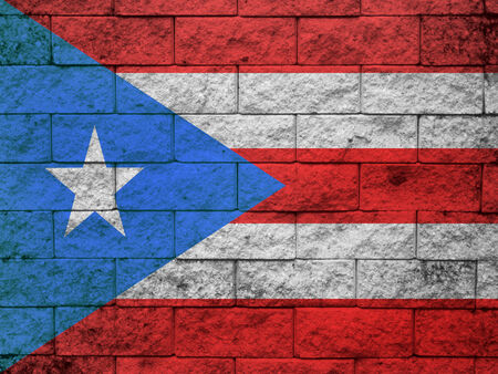 Puerto Rico Flag painted on grunge wallの写真素材