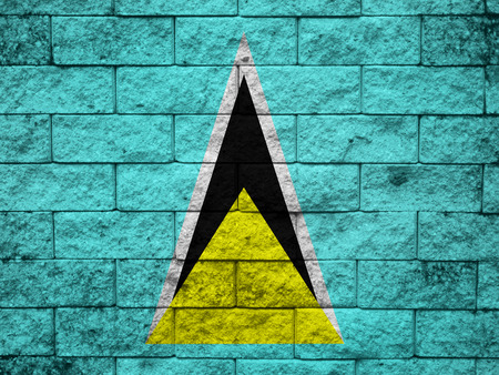 Saint Lucia Flag painted on grunge wallの写真素材