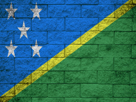 solomon islands Flag on the old wall textureの写真素材