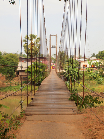 Suspension bridge across the riverの写真素材