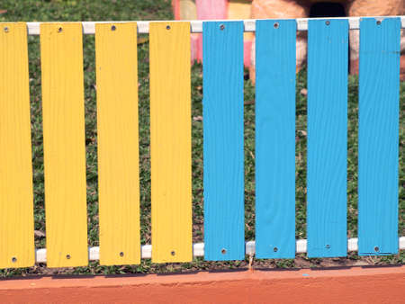 Colorful wooden fenceの写真素材