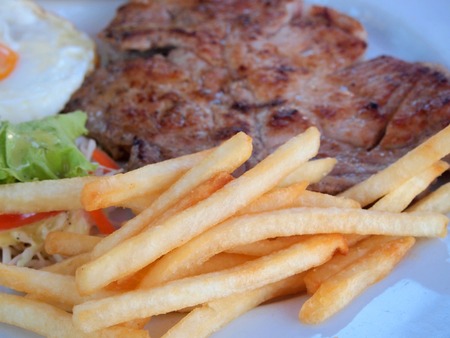 grilled steak with french friesの写真素材