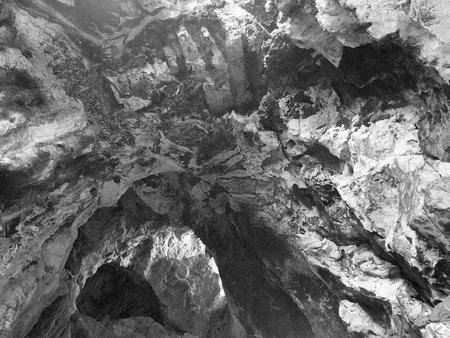 black and white Sun beam in caveの写真素材