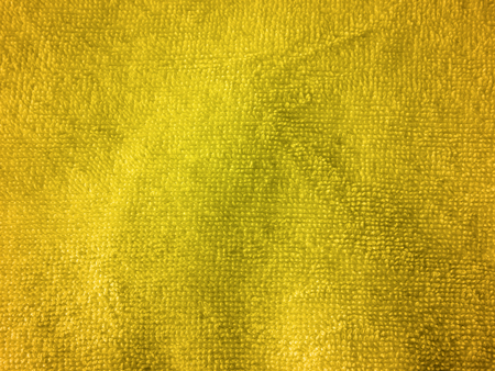 gold paint on fabric textureの写真素材
