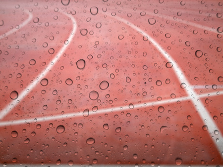 close up drops of rain on glass background. track out of focusの写真素材