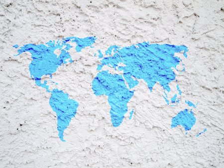 world map on white cement wallの写真素材