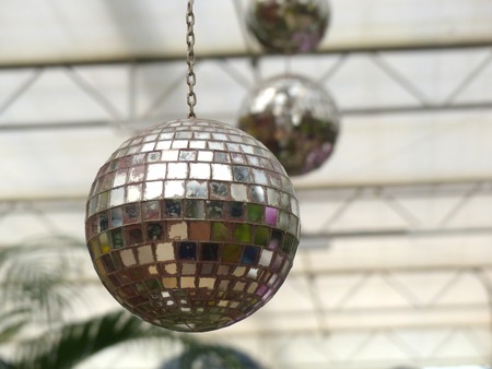 old silver disco mirror ballsの写真素材