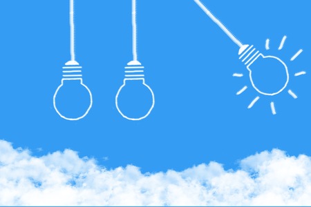think bulb cloud shaped on blue sky