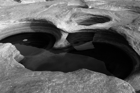 black and white stone mountain at Sam Phan Bok ,Grand canyon of Thailandの写真素材