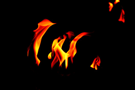 close up fire flames abstract on black backgroundの写真素材