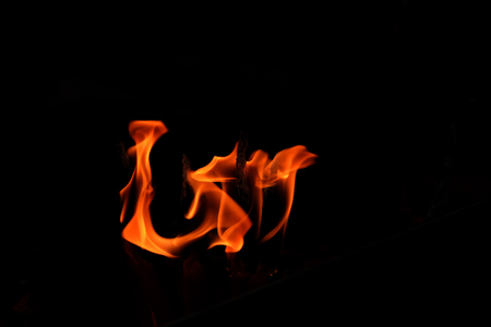 close up fire flames abstract on black backgroundの写真素材